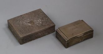 Two silver mounted cigarette boxes, largest 10.6cm.