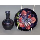 A Moorcroft purple lustre vase and an anemone dish Vase H.9cm, plate 11.5cm diameter
