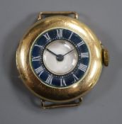 A lady's? early 20th century 15ct gold and enamel half hunter manual wind wrist watch, no strap.