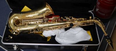 A cased brass saxophone