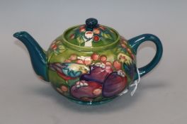 A Moorcroft Finches teapot and cover