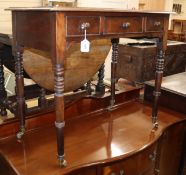 A Victorian mahogany leather inlaid writing table W.89cm