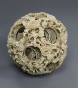 A large Chinese ivory concentric ball H.12cm