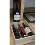 A magnum of Mouton cadet, 2003, a presentation box of three Spanish riojas, one Ch.la roseliere,