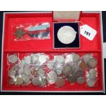 A cased medal and group of coins