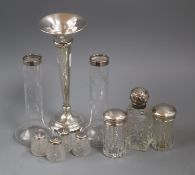 A silver trumpet vase, a silver mounted glass scent bottle and other items.