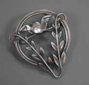 A Danish Georg Jensen sterling 'songbird and foliage' circular brooch, no.258, 39mm.