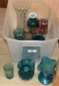 A group of green glass vessels, etc