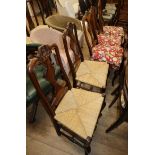 A set of five 19th century Continental fruitwood dining chairs