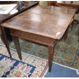 A North European inlaid oak extending dining table W.122cm closed