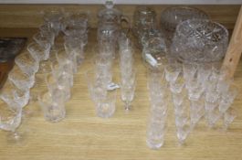 A part suite of table glasses, a set of four painted brandy balloons and various cut glass items,