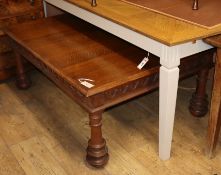 A Continental oak low table W.130cm