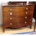 A mahogany serpentine chest of drawers, stamped H Mawerx Stephenson, London W.101cm