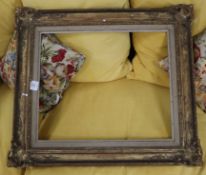 An 18th century style carved giltwood picture frame