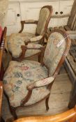 A pair of Louis XV style walnut fauteuils