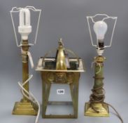 An Art Nouveau design brass hall lantern, a brass corinthian column table lamp and a brass and