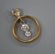 A 22ct gold wedding ring converted to a pendant and now set with two graduated diamonds, 26mm.