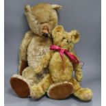 A large golden mohair straw-filled teddy bear, possibly by J. K. Farnell (damage and repairs) and