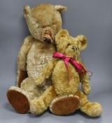 A large golden mohair straw-filled teddy bear, possibly by J. K. Farnell (damage and repairs) and