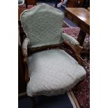 A Louis XV style beech fauteuil