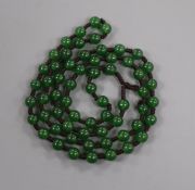 A Chinese green hardstone bead necklace