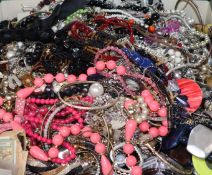 A large quantity of assorted costume jewellery.