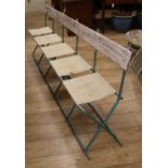 A pair of French folding canvas circus seats L.230cm