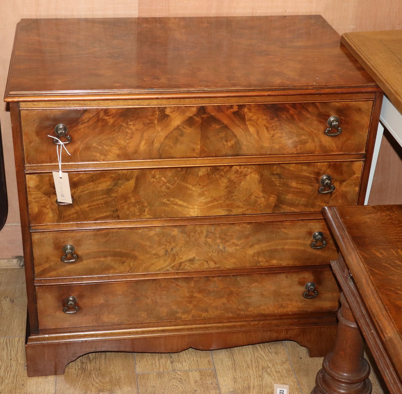 A Georgian style burr walnut small chest of drawers W.76cm