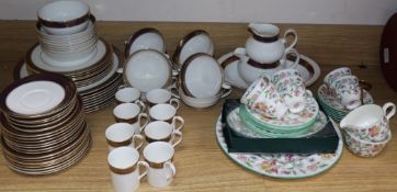 A Royal Doulton 'Rochelle' pattern dinner service and a Minton 'Haddon Hall' pattern tea service