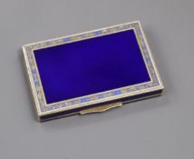 An early-mid 20th century Austro-Hungarian gilt white metal and enamel cigarette box, 9cm.