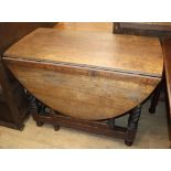 A late 19th century oak oval gateleg table W.104cm