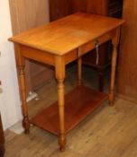 A reproduction oak side table W.80cm