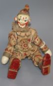 An unusual clown peg doll 20cm high