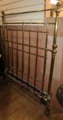 An early 20th century brass 4ft bed frame