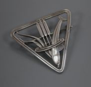 A Danish Georg Jensen sterling 'dolphin and bulrushes' triangular brooch, no.257, 37mm.