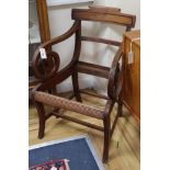 A Regency mahogany elbow chair (no seat)