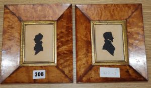 A pair of early 19th century cut paper silhouettes of Captain T.R. Shervinton and his wife, maple