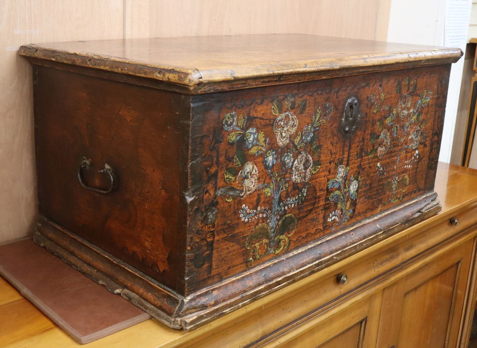 An 18th century Continental painted pine trunk W.99cm