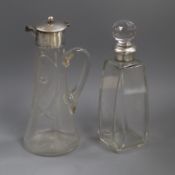 A George V silver mounted glass claret jug by James Deakin & Sons and a silver mouted glass decanter