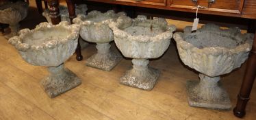 A set of six reconstituted stone garden planters H.44cm