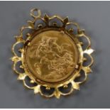 A George V 1911 gold full sovereign, in 9ct gold pendant mount.