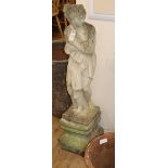 A reconstituted stone garden statue of a girl on pedestal base H.106cm
