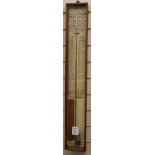 An Admiral Fitzroy barometer in oak case with paper scales H.88cm