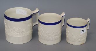 A graduated set of three Victorian relief moulded tankards (possibly Turner) Tallest 12cm