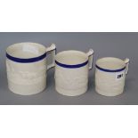 A graduated set of three Victorian relief moulded tankards (possibly Turner) Tallest 12cm