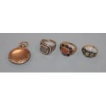 Three assorted 19th century rings including mourning ring (a.f.) and a similar yellow metal locket.