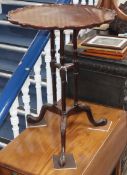 A George III style mahogany triple stem occasional table Diameter 52cm