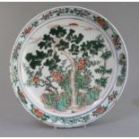 A Chinese famille verte dish, Kangxi period, painted with the Three Friends of Winter, with