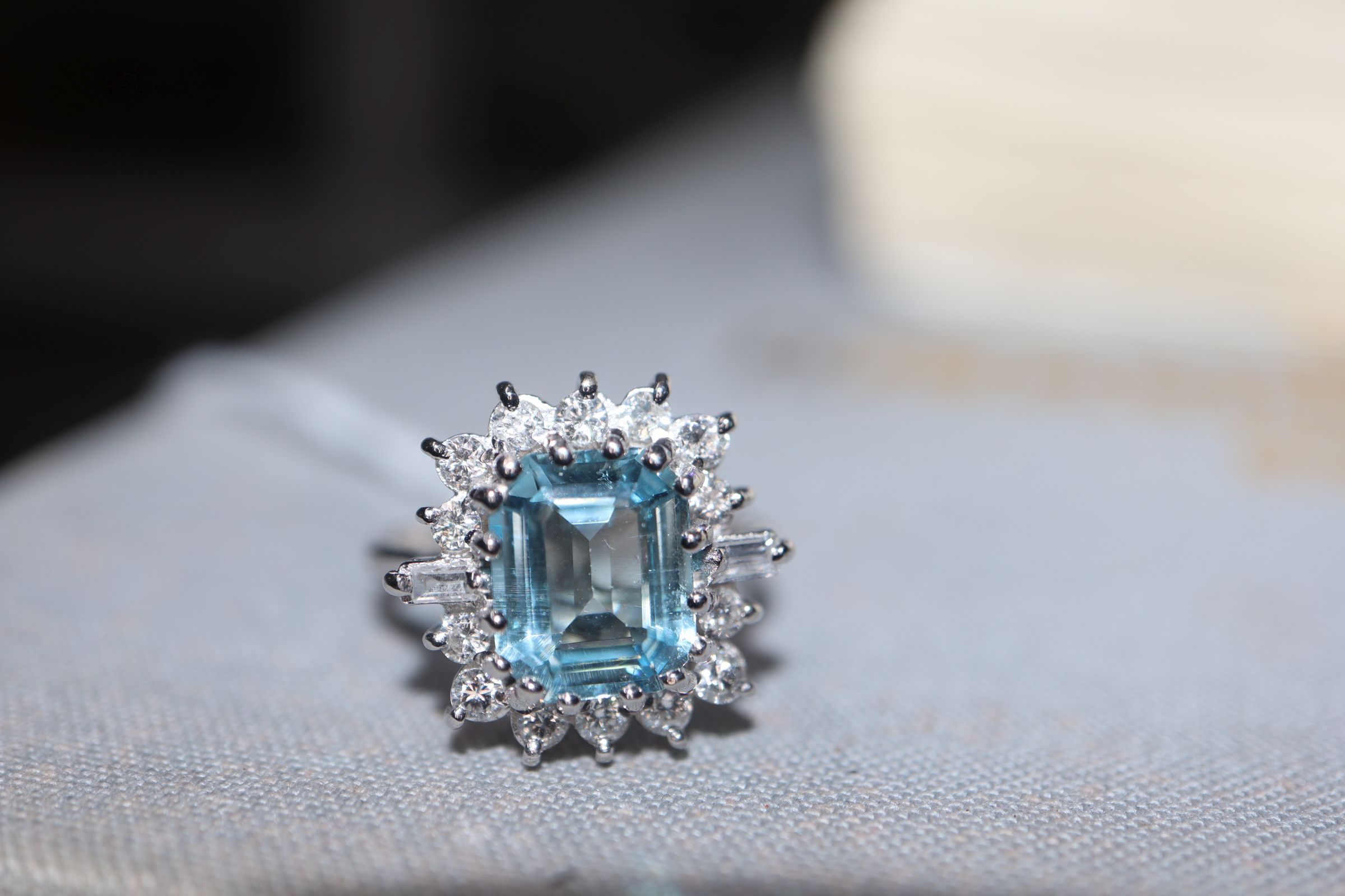 A modern 18ct white metal, aquamarine, baguette and round cut diamond set cluster ring, size K/L. - Image 5 of 6