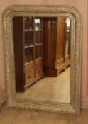 A 19th century French giltwood and gesso wall mirror H.104cm